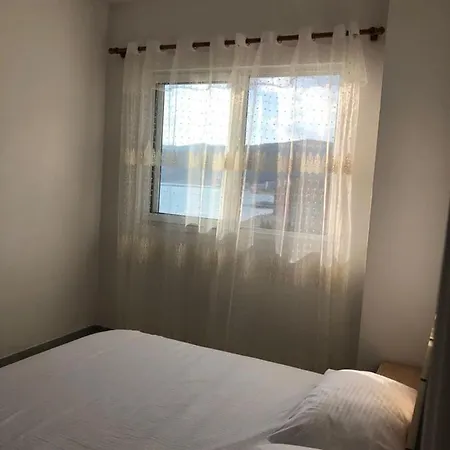Shengjin Apartments Hotel *
